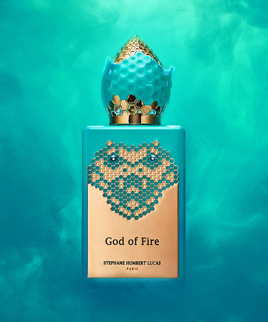 God of Fire de Stéphane Humbert Lucas sobre un fondo turquesa